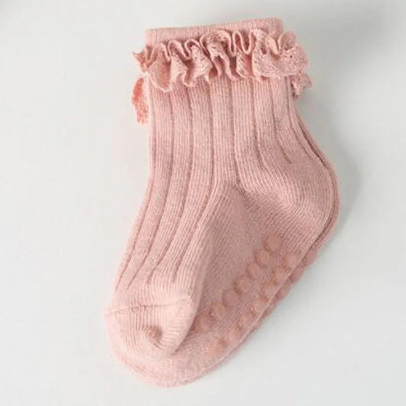 Chaussettes fantaisie antidérapantes bébé fille (4 paires)