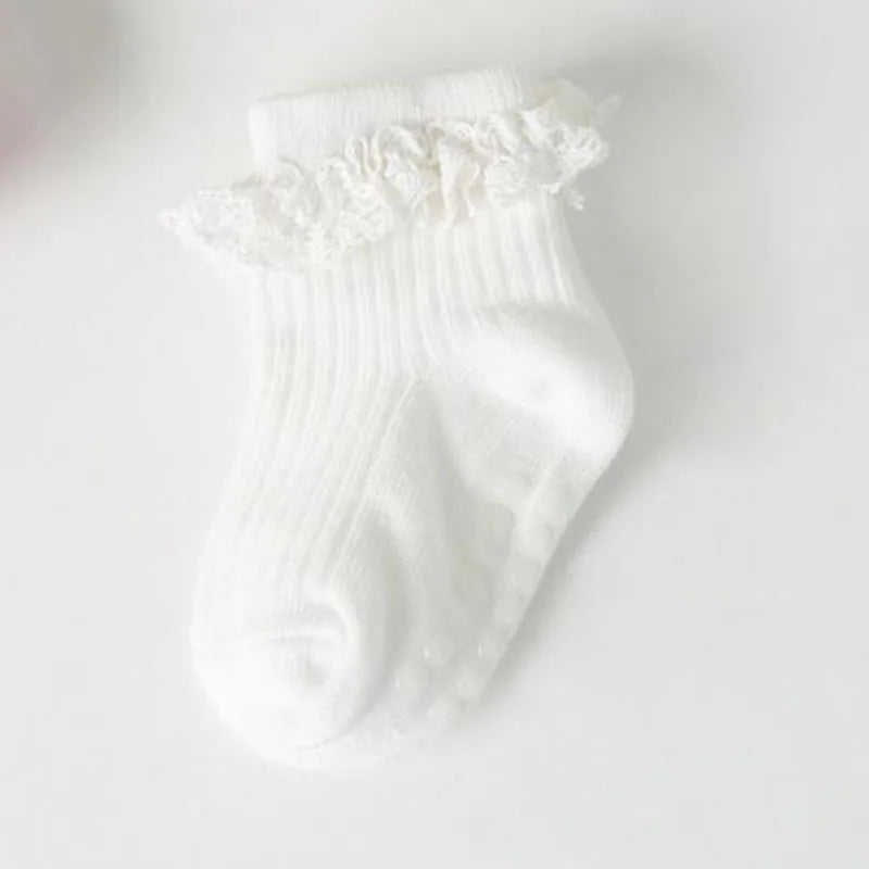 Chaussettes fantaisie antidérapantes bébé fille (4 paires)